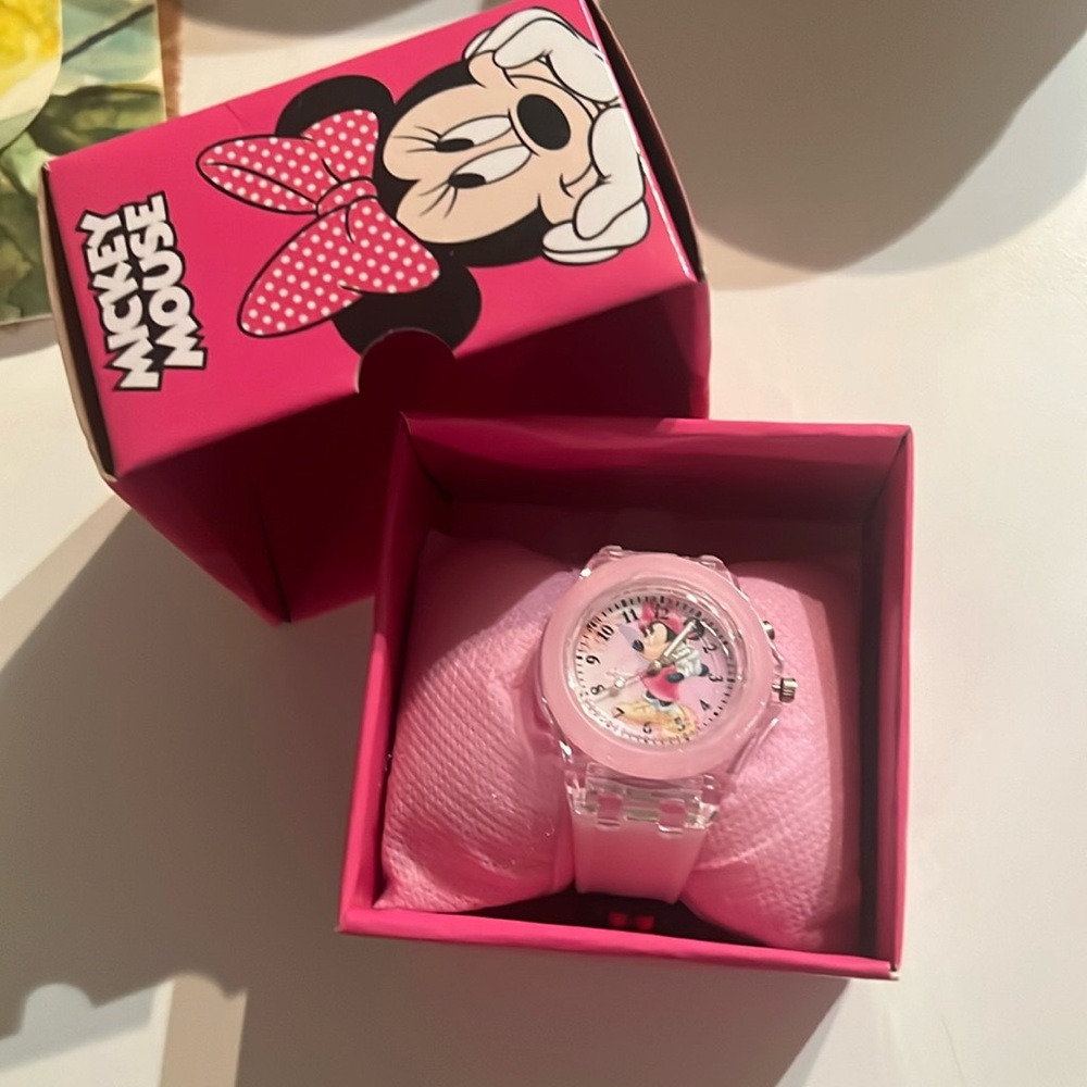 Minnie Mouse watch, lights up. Adjustable band.